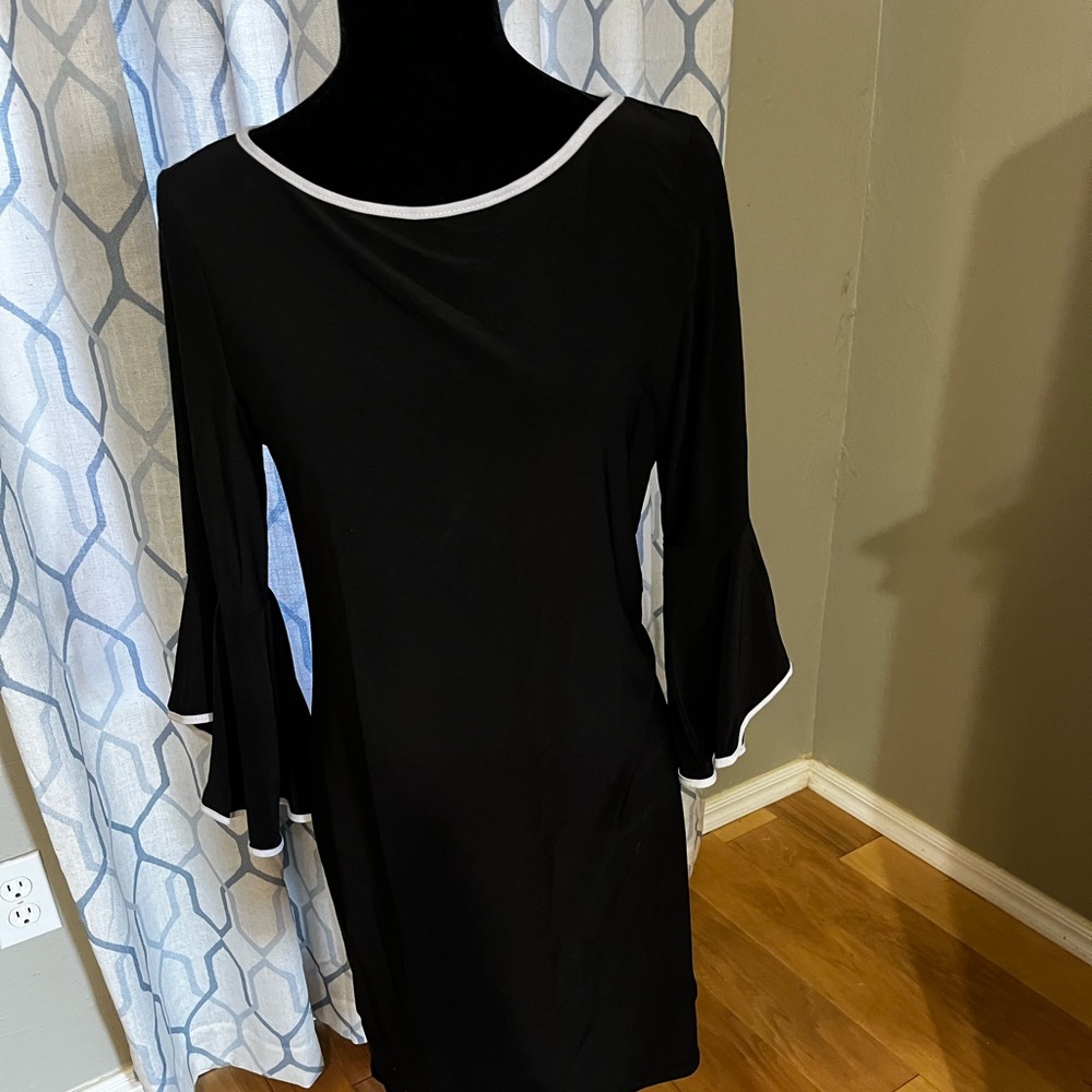 Little black dress with trendy sleeves